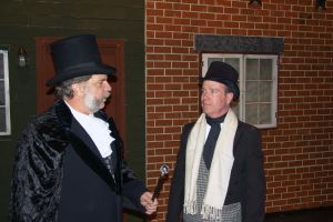Ebeneezer Scrooge and Bob Cratchit