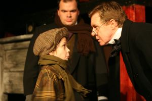 Caroler, Bob Cratchit and Scrooge