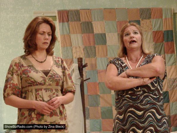 Lenny Magrath (Cynthia Huesman) and Cousin Chick (Mary Fettes) discuss family problems
