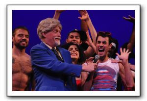 Lyle Blake Smythers (Chuck Farley) and Ray Bracken (Darius) with Ensemble