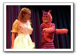 Cassie Youhouse as Alice and Callie Seaman as Cheshire Cat