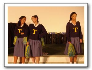 Joanne (Carla Francischetti), Kathy (Pamela Sabella), Mary (Natalie Christina) during their high school cheerleading days planning for the football pa