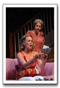 Melissa (Beth Hylton) offers some great reading material to Mary (Brigid Cleary)