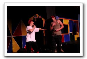 Morgaine Gooding-Silverwood as Isabella/Fabrizio and Sean Casey as Capitano