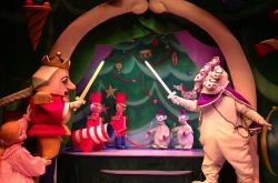 The Nutcracker and his toy soldiers battle the Mouse King and his minions