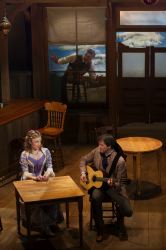 Bianca (Sarah Mollo-Christensen) with suitors Hortensio (Marcus Kyd, foreground) and Lucentio (Thomas Keegan, in window)