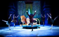 Maugrim the Wolf (Dylan Keane - center) and the White Witch's minions taunt Aslan