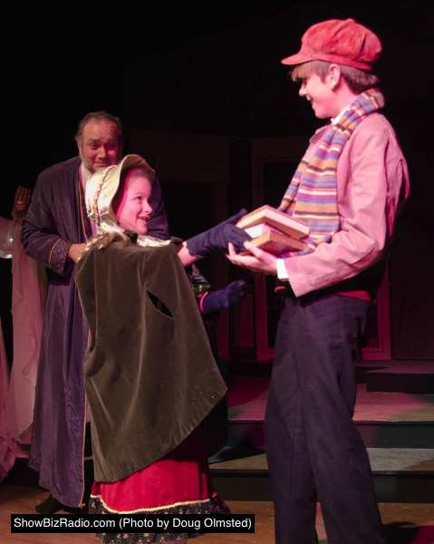 Elliott Bales (Scrooge), Grace Keefe (Fan), and Julian Worth (Boy Scrooge)