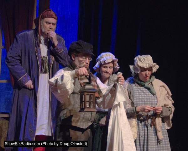 Elliott Bales (Scrooge), Terry Gish (Old Joe), Melanie Bales (Laundress), and Heather Norcross (Housekeeper)