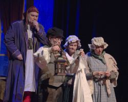 Elliott Bales (Scrooge), Terry Gish (Old Joe), Melanie Bales (Laundress), and Heather Norcross (Housekeeper)