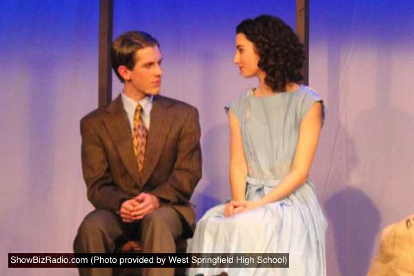 Peter Van Daan (William Shipley) and Anne Frank (Catherine Ariale) share an intimate moment up in the attic