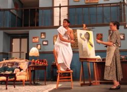 lying on couch is Chloe Vasquez, standing on chair Matt Manalel, and standing by easel is Katie McVicar<br />“></a></td><td width=