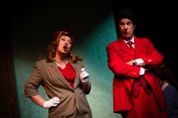 Gloria Thorpe (Janette Moman) interviews Applegate (Mike Baker)