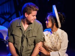 American GI Chris (Gannon O'Brien, left) and Vietnamese bargirl Kim (Diana Huey) find love during wartime