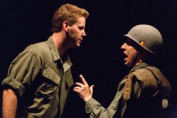 American GI Chris (Gannon O'Brien, left) speaks with a Marine (James Gardiner)