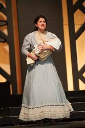 Mother (Sarah Kinney) finds an abandoned negro child in her garden and wonders 'What Kind of Woman' would do such a thing