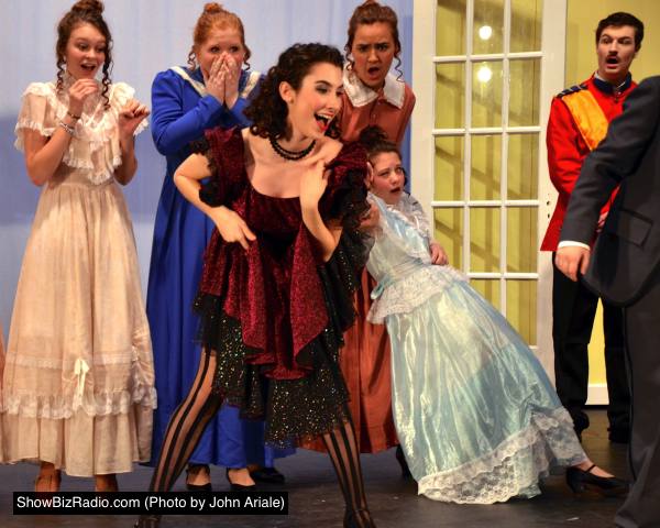 Famed Parisian can-can dancer 'The Shrimp' (Catherine Ariale) shocks the French provincials (Bonnie McClellan, Maggie Rabe, Emily Becker, Mallory Astrow and Alex Nelson) by flashing her drawers