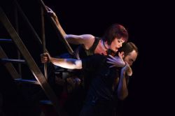 Meg Gillentine as Yvette and Dan Istrate