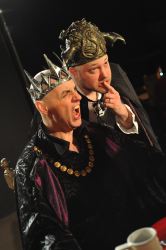 Charles Boyington is Lord Fango and Carl Brandt Long is Bat Guard #1