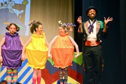 Melissa Handel, Faith Skeen and Mia Parnaby as Oompa-Loompas and Sedrick Moody as Willy Wonka